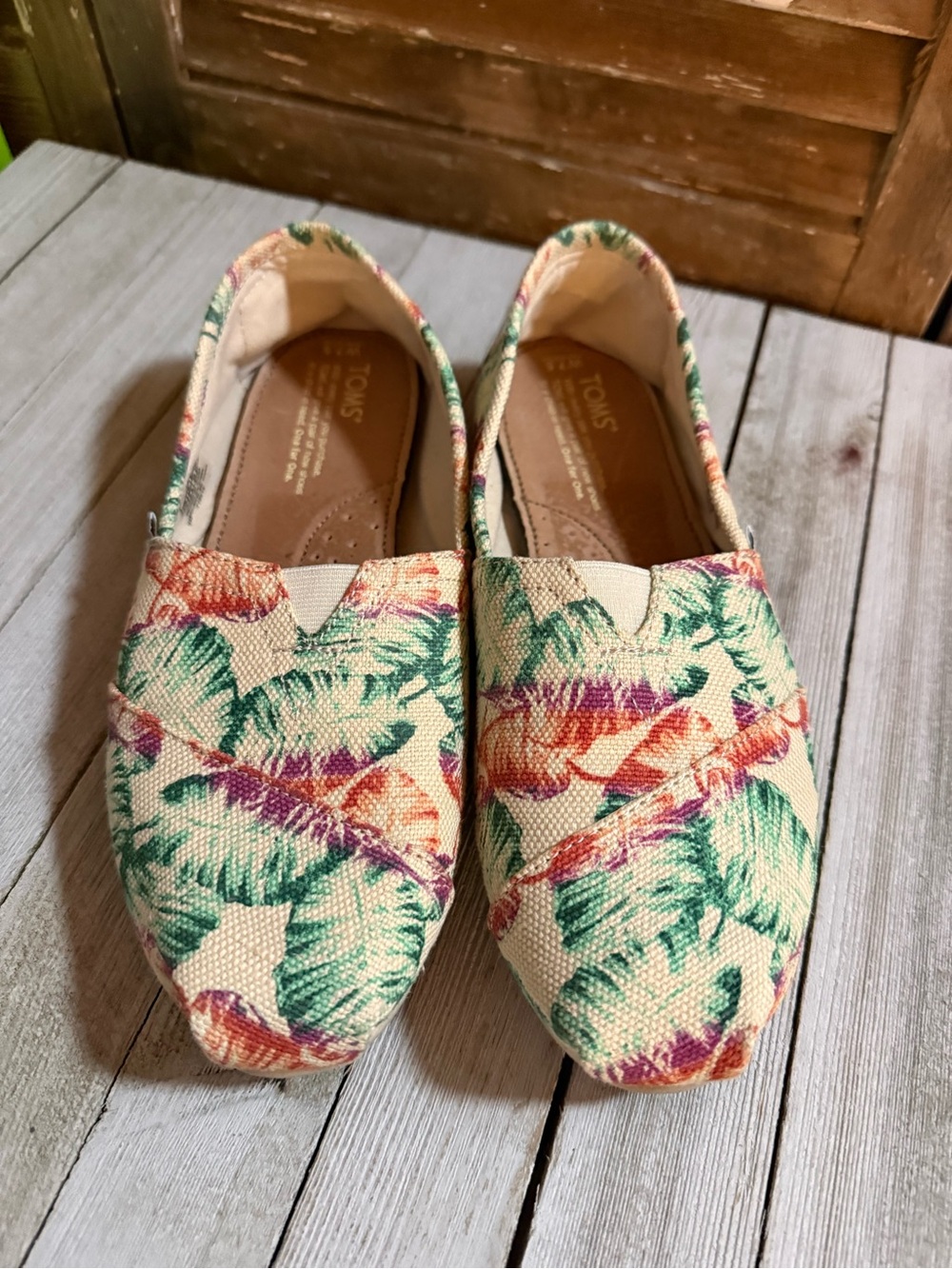 TOMS Cream Tropical Print Slip-On Flats with Green and Orange Leaves